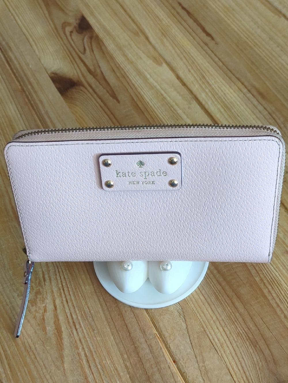 kate spade pale pink zip-around leather wallet